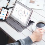 a man holding a keyboard