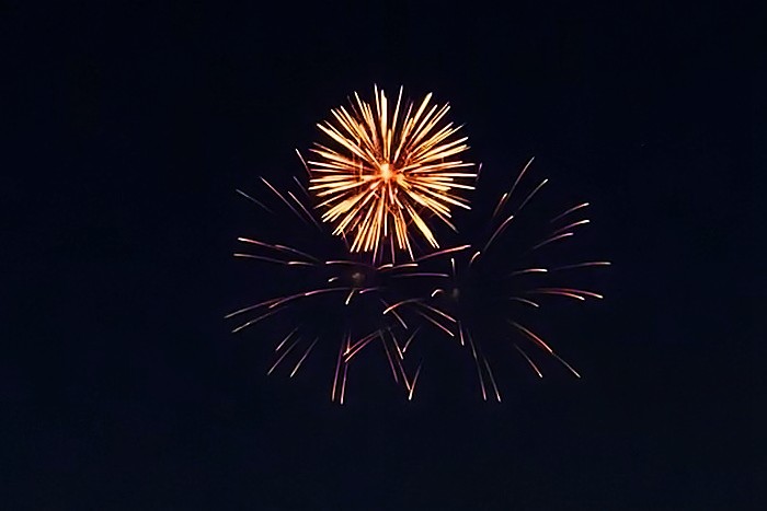The enhanced version of the fireworks image, showing less grain and blurred lights