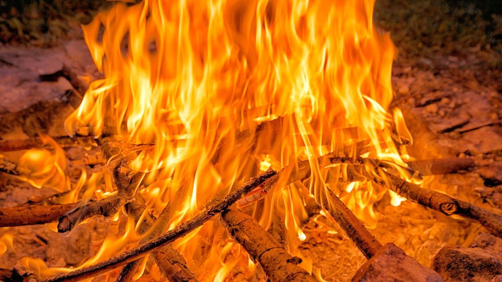 The bonfire photo now has less shadows, revealing some more detail