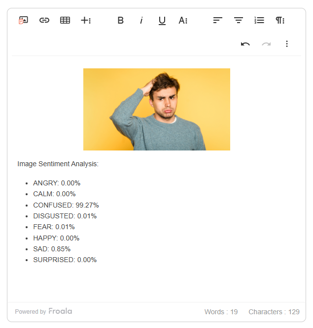 The visual HTML WYSIWYG editor with an uploaded image of a man scratching his head. In the WYSIWYG editor, it was determined by Filestack's image sentiment detector that the primary emotion of the person in the image is "confused" (99.27%).