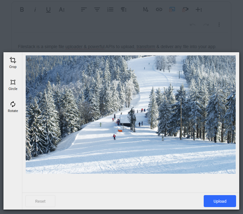 A picture of a wintery ski slope is uploaded using the WYSIWYG editor